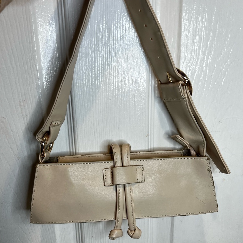 LEATHER ELONGATED SMALL SOFT HANDBAG